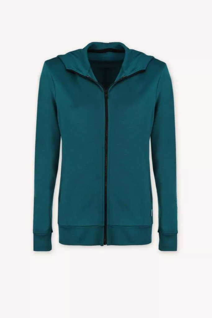 Dámská mikina na zip s kapucí z wělny merino 100% - petrol (250 g), dlouhé rukávy, přední kapsy, černý zip, minimalistický design, bílé pozadí.