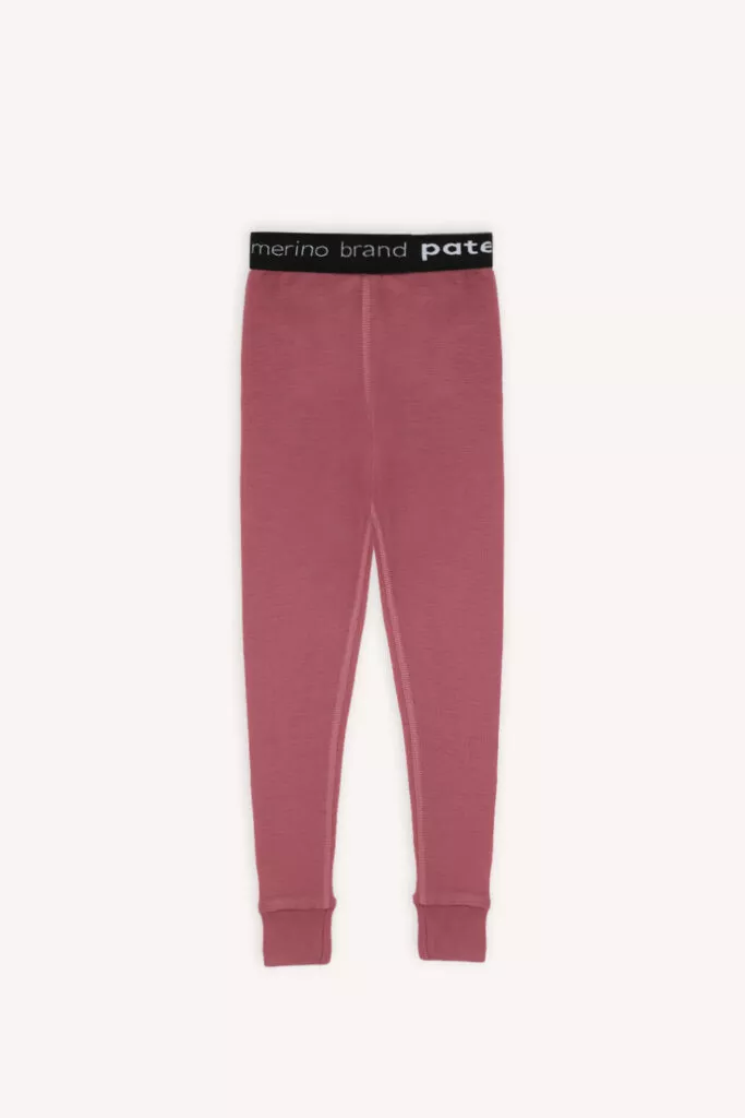 Dětské legíny Merino termoprádlo - starorůžová (180 g) z wełny merino 100%, s manžetami a černou gumou s bílým textem, na světlém pozadí.